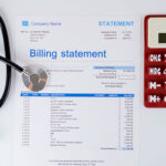 Medical billing and healthcare paperwork concept image, representing out-of-state medical debt and bankruptcy relief for Florida residents