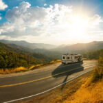 Recreational vehicle driving on open road representing RV bankruptcy exemptions and asset protection in Florida